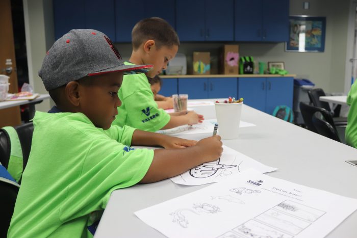 SeaCampers color during educational activity