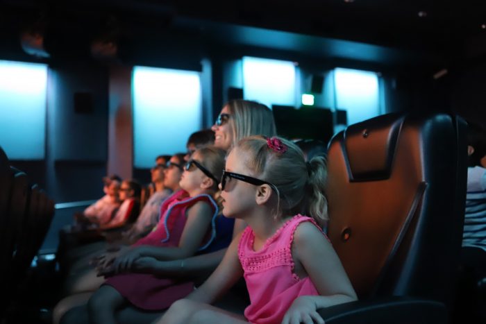 Guest watch show in Whataburger 4D Theater
